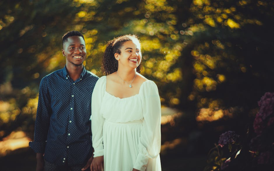 Fashionable couple in park setting